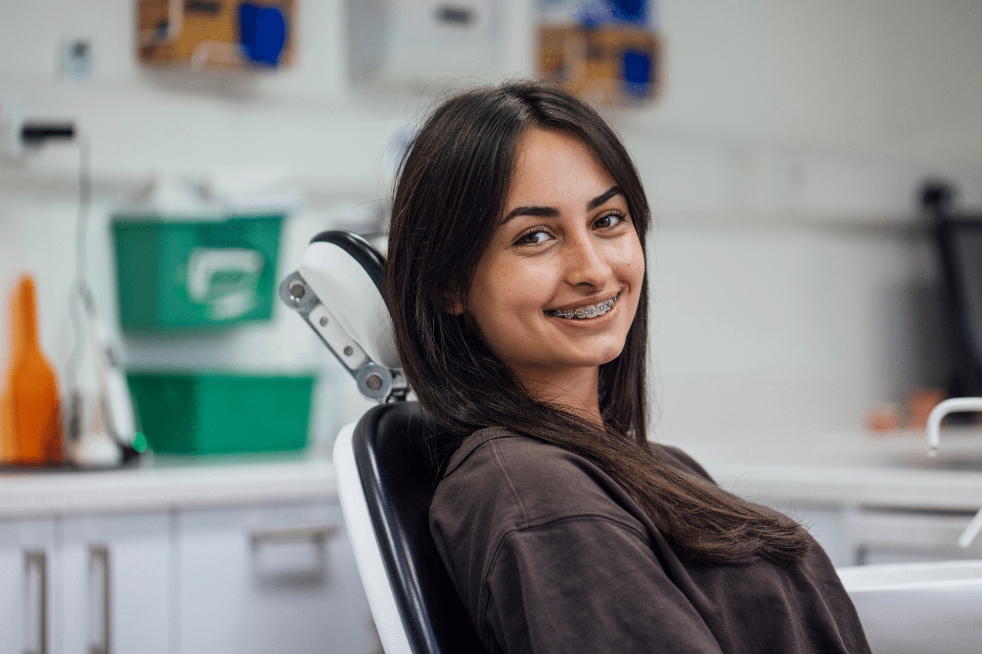 Patient with braces during orthodontic treatment planning in Newark, DE
